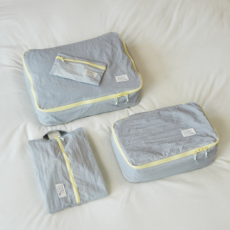 Four-piece set of thin and light suitcase storage bags