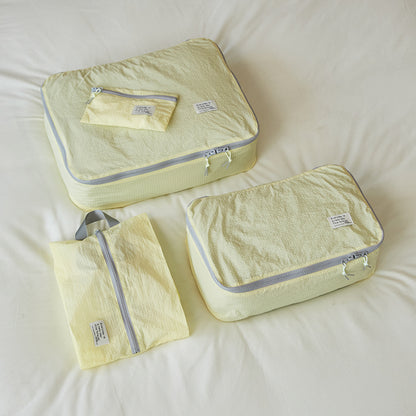 Four-piece set of thin and light suitcase storage bags