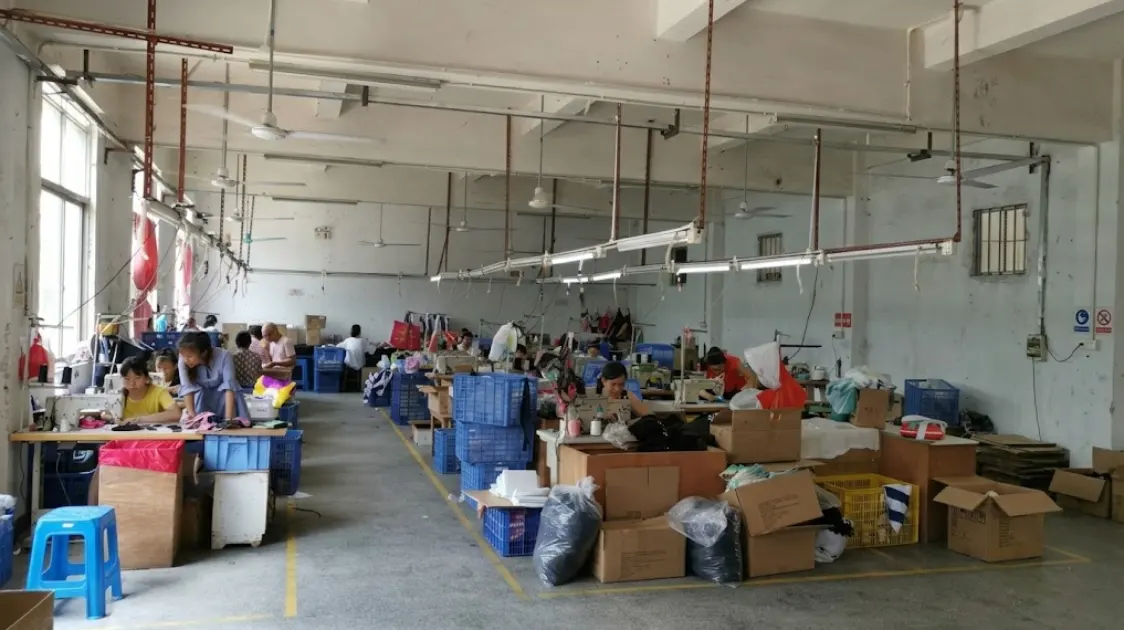 China factory audit transparency showing YJXpack production floor with multiple sewing stations available for virtual factory tour