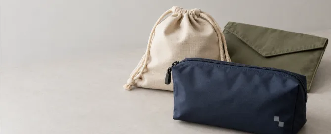 Fabric travel bag samples including zipper, drawstring and envelope pouch formats