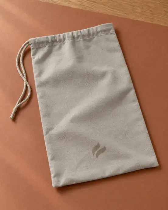 Shoe Dust Bag and Shoe Box Fit Open shoe box showing a folded pair-shoe dust bag and a separate single-shoe bag with neutral shoes.
